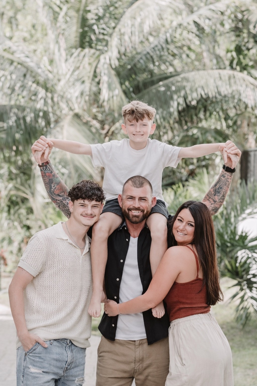 The McLeod family together outdoors